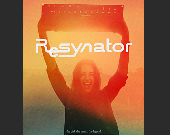 A woman holds a box musical synth above her head