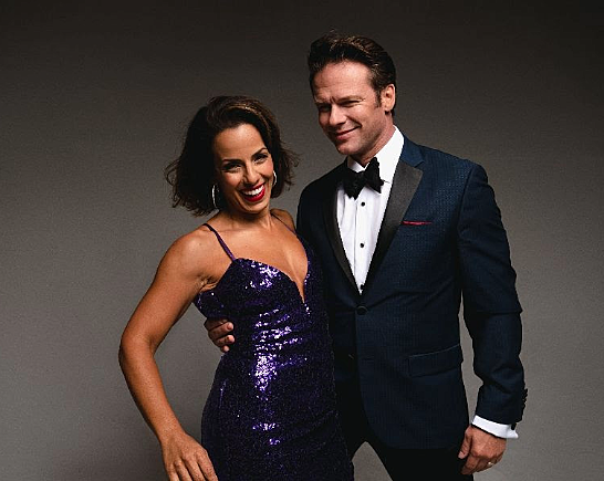 Woman and man dressed in formal wear are Cabaret Singers Nic & Desi
