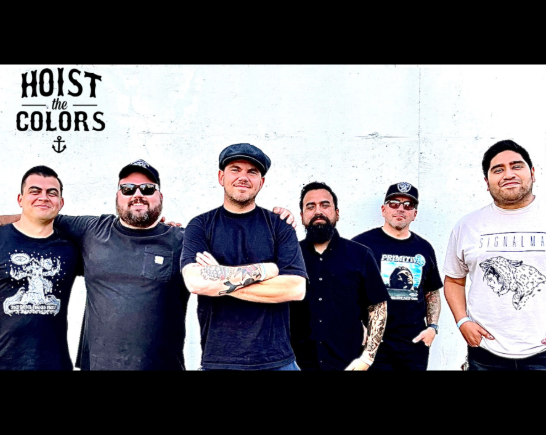 Six male band members of Los Angeles Irish folk punk band Hoist The Colors