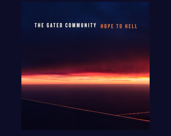 arial view a horizon of Orange and red upon night sky with two lonely highways reflecting the red glow like ribbons of fire