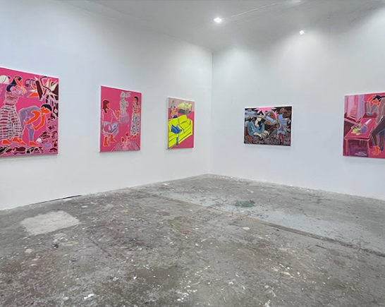 Serious Topics Gallery Exhibit Artist Michael Arata Paintings on white walls with paint splattered concrete floor