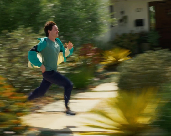Actor Danny Breslin runs in the film COIN