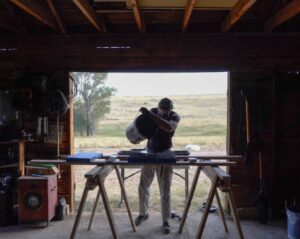 Artist William T Carson in his Montana Studio Working with coal, mica, and water.