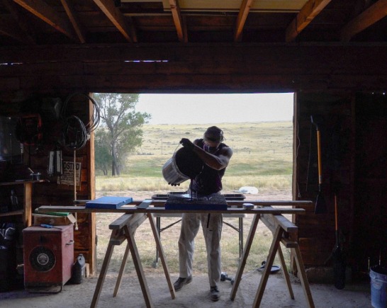 Artist William T Carson in his Montana Studio Working with coal, mica, and water.