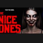 A scary young blonde woman with white, eyes without irises has blood around her mouth and a terrifying smile. Movie poster for The Nice Ones