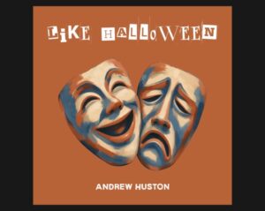 Comedy tragedy masks over dark orange background